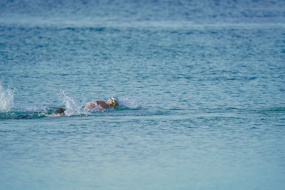 Swimmer competing in the open sea near Kuşadası, showcasing stamina and technique.